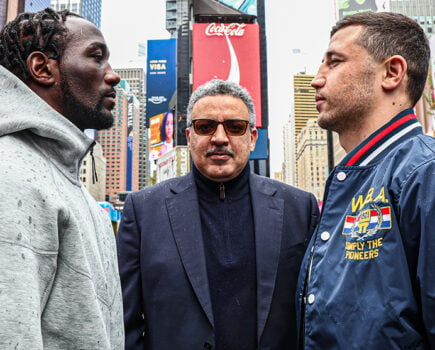 Crawford (L), Madrimov (R) pose in Times Square, New York. Mandatory Credit: Ed Mulholland/Matchroom.